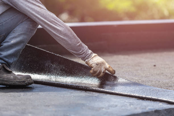 Professional Basement Waterproofing technician working in Auburn, MI